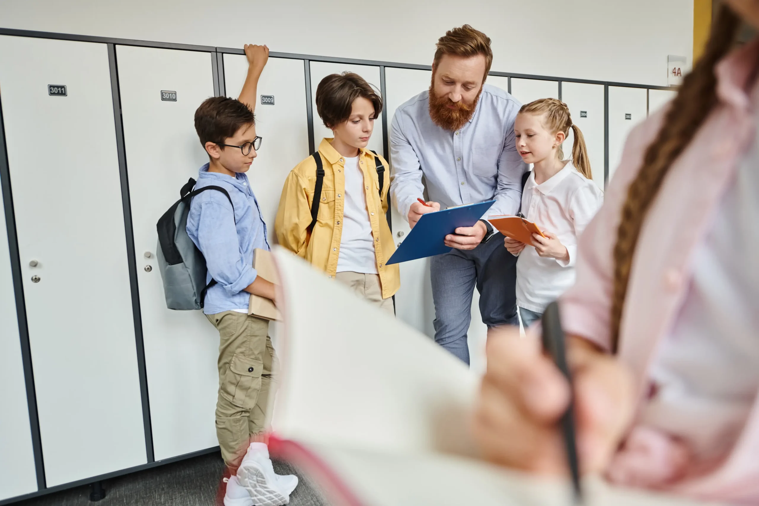 Header image with man showing three kids a clipboard